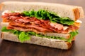 Closeup 3D rendering of a BLT sandwich with bacon, lettuce, and tomato Royalty Free Stock Photo