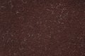 Closeup of dark color carpet textile textured wallpaper