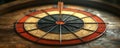 Closeup of a dart hitting the bullseye on a richly textured dartboard. The image evokes themes of success, accuracy, and