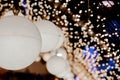 Closeup decorate Christmas lamps hang interior tunnel lights on blurred and bokeh of led reflection lightning in night time