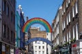 Closeup of decorations hanging above Carnaby Street in London.