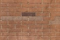 Closeup of a decorative brick wall with one dark brick Royalty Free Stock Photo