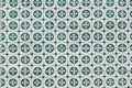 Closeup of decorative floral tiles. Traditional Portuguese ceramic tile pattern, azulejos. Clover. Irish green color