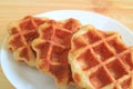 Closeup Delectable Belgian Waffles Served on a White Plate