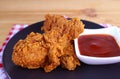 Delectable Golden Brown Crispy Fried Chicken Drumsticks Served with Dip