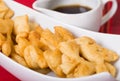 Closeup of delicious ecuadorian pristinos, piled up fresh from the fryer, traditional andean pastry suitable for coffee