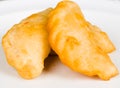Closeup delicious empanadas lying in a small white bowl