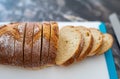 Closeup of delicious homemade artisan wheat bread, partially sliced Royalty Free Stock Photo