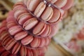 Closeup of delicious macaroons on candy bar