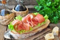 Closeup of delicious parma ham sandwich on wooden backgraund table Royalty Free Stock Photo