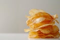 Crispy potato chip stack on neutral background Royalty Free Stock Photo