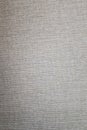 Closeup dense linen for curtains, beige, gray color. Vertical photo