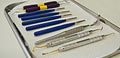 Closeup of dental instruments on a metallic tray on the table Royalty Free Stock Photo