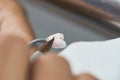 Closeup of dental technician putting ceramic to dental implants Royalty Free Stock Photo