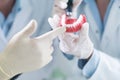 Closeup of dentistry student practicing on a medical mannequin