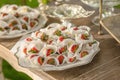 Closeup of Desserts prepared for guests of a Wedding party or a Birthday Strawberry in white milk Chocolate next to Royalty Free Stock Photo