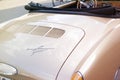 closeup Detail of old Cabriolet Volkswagen karmann ghia cabrio Typ 14 parked on street, part of beige car, trunk lid, Bacharach, Royalty Free Stock Photo