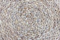 Closeup detail of A circle knitted fabric weaving mat or pad with round pattern for table protection from heat ,background texture