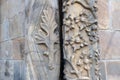 Closeup detail of geometrical and floral patterns carved in stone at the entrence to the gothic cathedral of St. John the Baptist