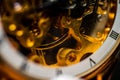 Closeup detail of the internal mechanism of a vintage analog clockwork