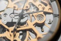 Closeup detail of the internal mechanism of a vintage analog clockwork