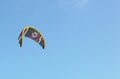 Closeup detail of kite surfing kite equipment wings flying against a clear sky on a bright sunny day at a kiter surf Royalty Free Stock Photo