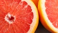Closeup detail of pink grapefruit cut in half Royalty Free Stock Photo