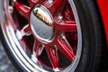 Closeup detail of Red Aluminum car wheel. Neural network AI generated