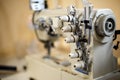 Closeup details on sewing machine overlock. Workplace seamstress.Tailoring industry