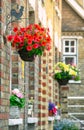 Closeup detial of English houses with hanging baskets Royalty Free Stock Photo