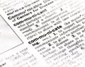 Closeup of the dictionary definition of the word communicate Royalty Free Stock Photo