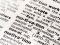 Closeup of the dictionary definition of the word motivation Royalty Free Stock Photo