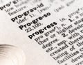 Closeup of the dictionary definition of the word progress Royalty Free Stock Photo