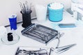 Closeup of different dental tools on dentist workplace