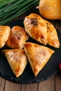 Different oriental baked pie with meat samsa