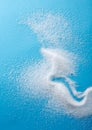 Closeup different shapes of sugar on blue background