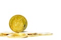 Closeup of a digital dog coin on a bunch of golden coins isolated on a white background Royalty Free Stock Photo