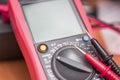 Closeup of Digital Multimeter Unit with Two Probes Connected Royalty Free Stock Photo