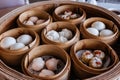 Closeup Dim sum set: Barbecued pork bun, Shrimp dumpling, Sweet cream buns, Shrimp shumai topping with goji berry. Royalty Free Stock Photo