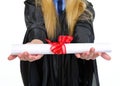 Closeup on diploma in hand of young woman Royalty Free Stock Photo