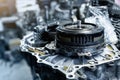 Closeup disassembled car automatic transmission gear part on workbench at garage or repair factory station for fix Royalty Free Stock Photo