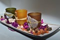 Closeup of display with dried flowers and aromatic candles on a platter