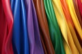Closeup of diverse Pride flags draped elegantly. Generative ai