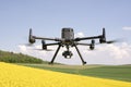 Closeup DJI M300 RTK flight in canola camp Royalty Free Stock Photo