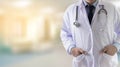 Closeup Doctor in blurred of hospital colleague and hand holding