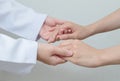 Doctor shakes hands with a patient