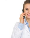 Closeup on doctor woman speaking mobile phone Royalty Free Stock Photo