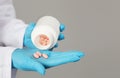 Closeup Of Doctor's Hands Pouring Pills From Medical Bottle, Studio Royalty Free Stock Photo