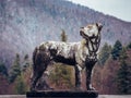 Closeup of a dog statue in Peles Castle in the daylight in Romania Royalty Free Stock Photo