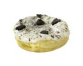 Closeup donut with white icing and chocolate cookies topping isolated on whith